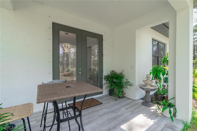 entrance to property with a patio