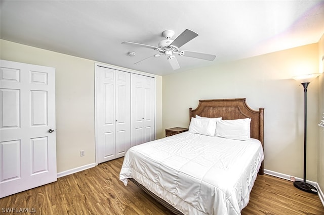 bedroom featuring a closet, ceiling fan, and hardwood / wood-style floors