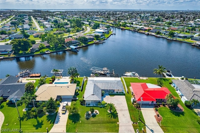 bird's eye view with a water view