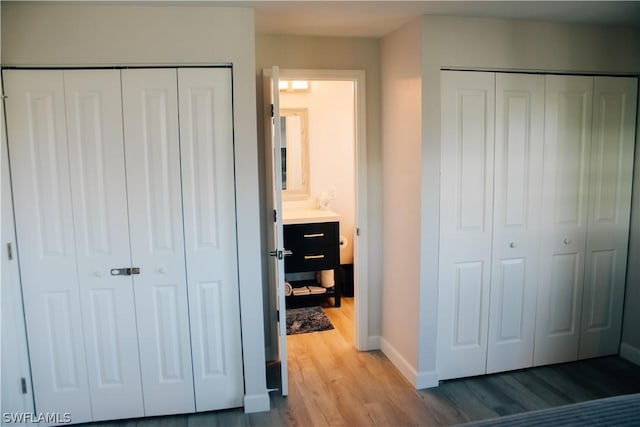 bedroom featuring wood-type flooring