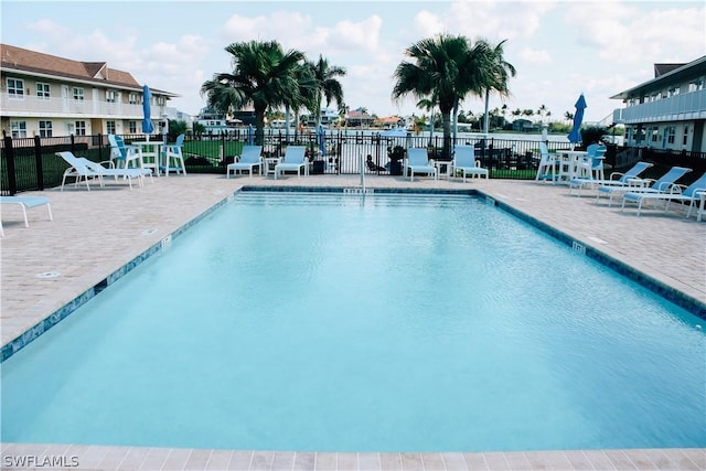 view of pool featuring a patio