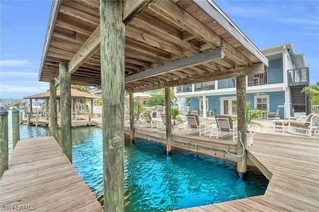 dock area featuring a water view