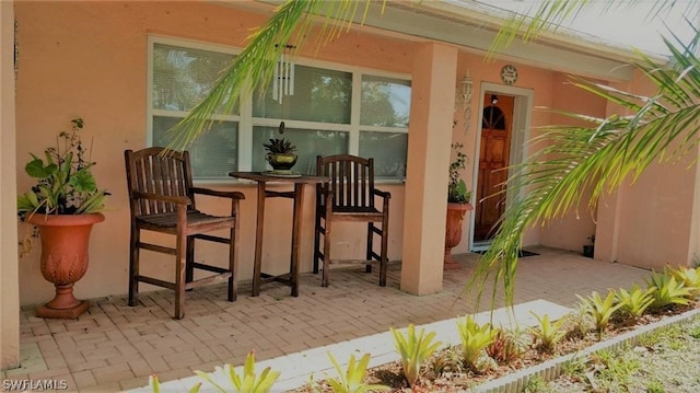 doorway to property featuring an outdoor bar