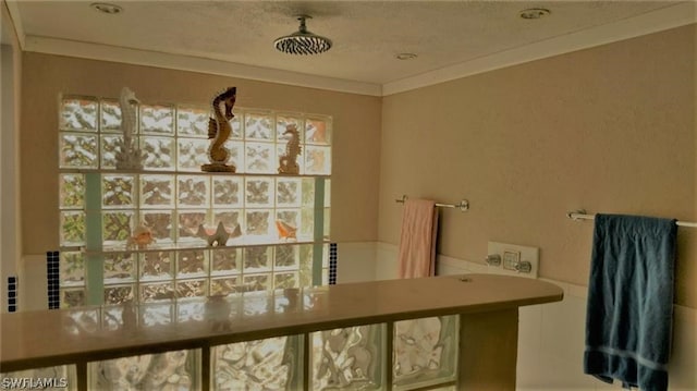 bathroom with crown molding