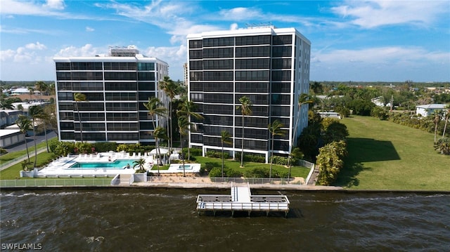 view of building exterior featuring a water view