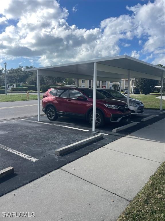 view of car parking with a carport