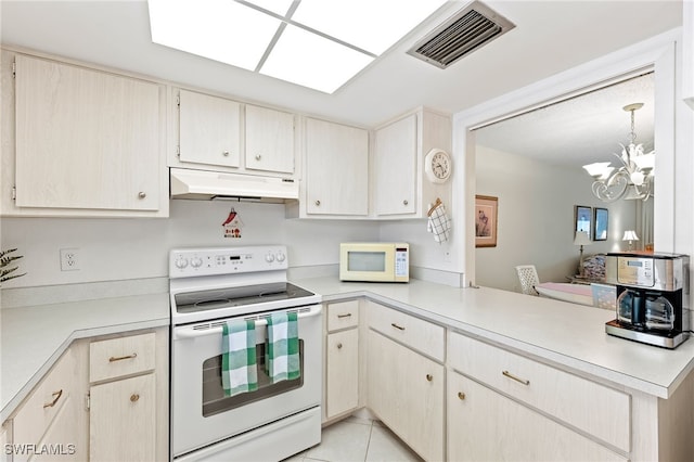 kitchen featuring hanging light fixtures, an inviting chandelier, kitchen peninsula, white appliances, and light tile patterned floors