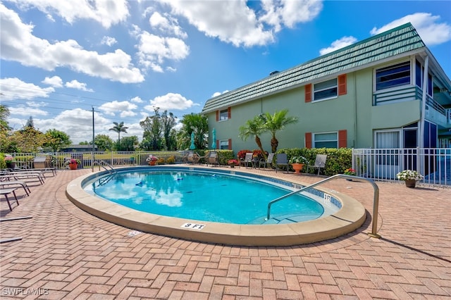 view of pool with a patio area