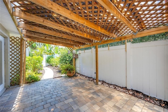 view of patio featuring a pergola