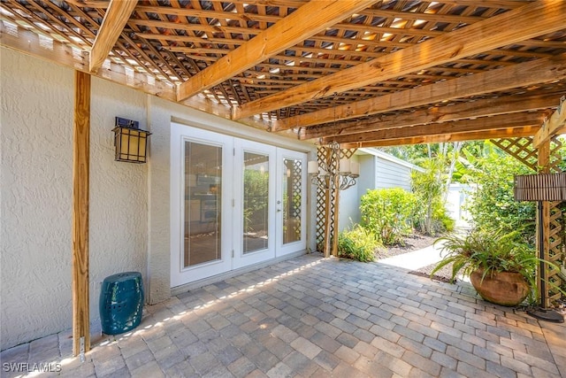 view of patio featuring french doors