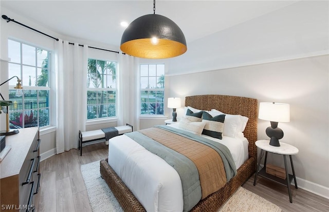 bedroom featuring light wood-type flooring