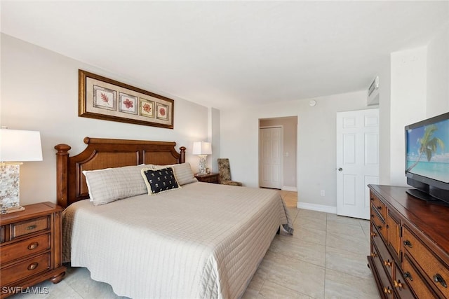 bedroom featuring baseboards