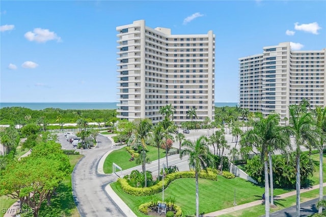 exterior space featuring a city view and a water view