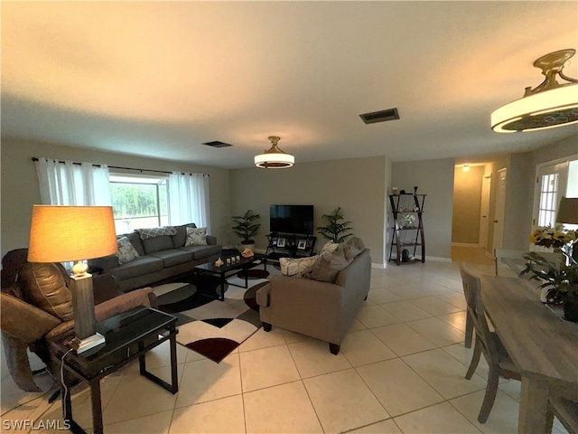 living room featuring light tile patterned floors