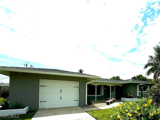 single story home featuring a garage