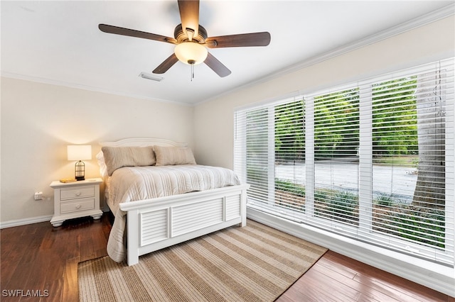 bedroom featuring hardwood / wood-style floors, crown molding, access to outside, and ceiling fan