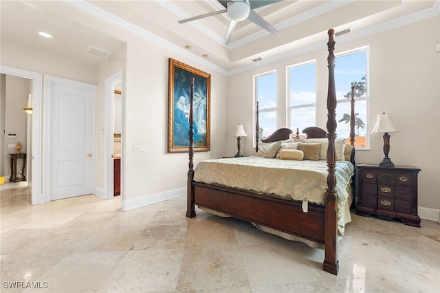 bedroom featuring a raised ceiling, ornamental molding, ceiling fan, and ensuite bath