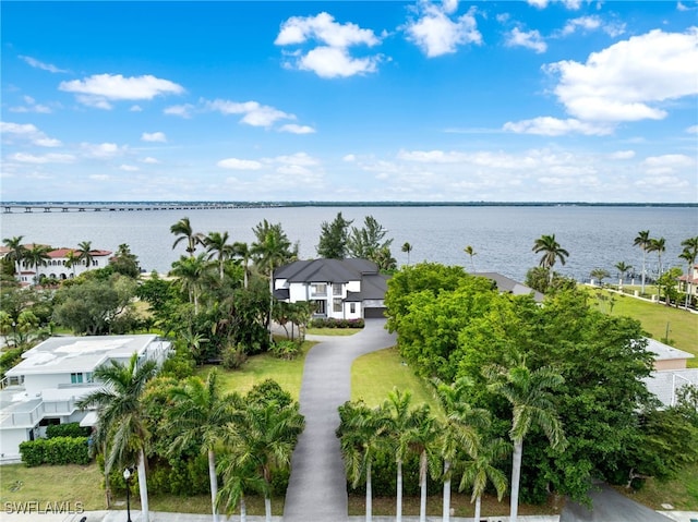 drone / aerial view with a water view