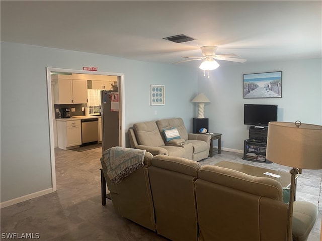 living room featuring ceiling fan