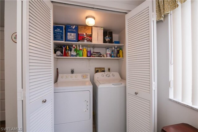 laundry room featuring washer and clothes dryer