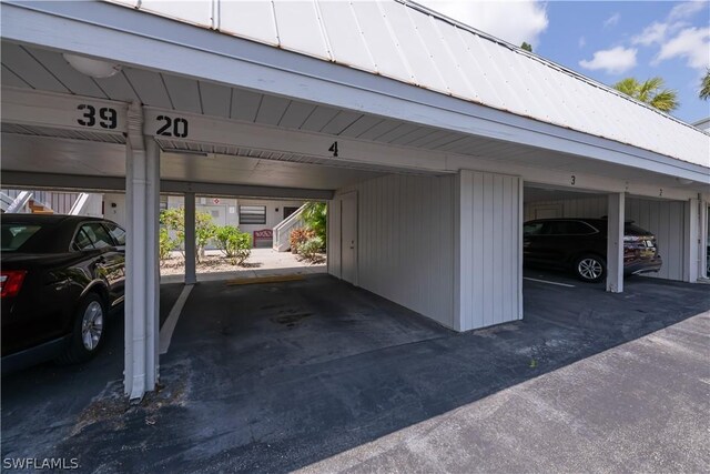 garage with a carport