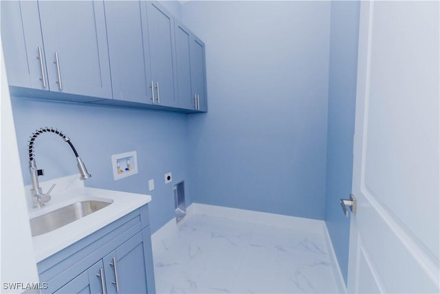 laundry area with cabinets, washer hookup, electric dryer hookup, and sink