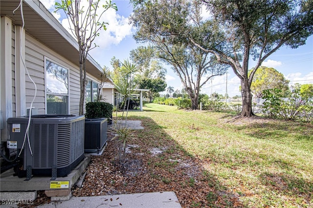 view of yard with central AC unit