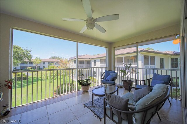 sunroom / solarium with ceiling fan