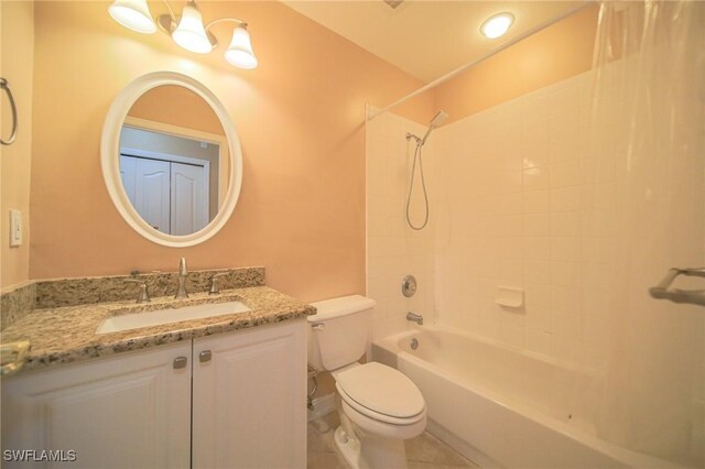 full bathroom featuring tile patterned floors, shower / bath combo, toilet, and vanity