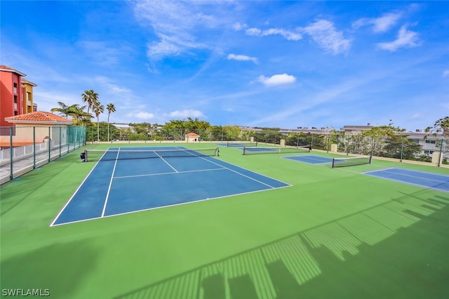 view of tennis court with basketball court