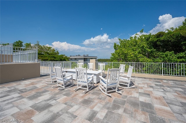 view of patio / terrace with a fire pit