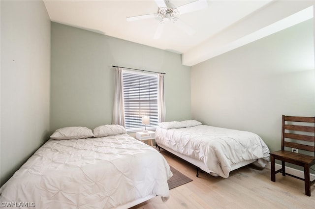 bedroom featuring ceiling fan and light hardwood / wood-style flooring