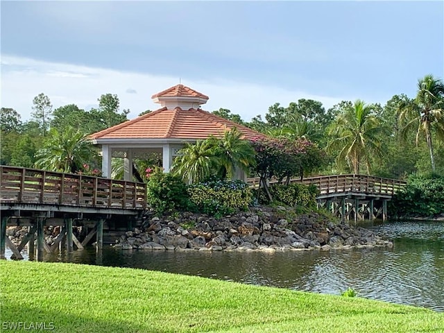 view of home's community featuring a gazebo and a water view