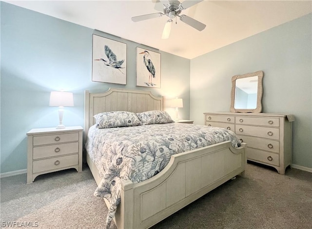 bedroom with ceiling fan and carpet floors