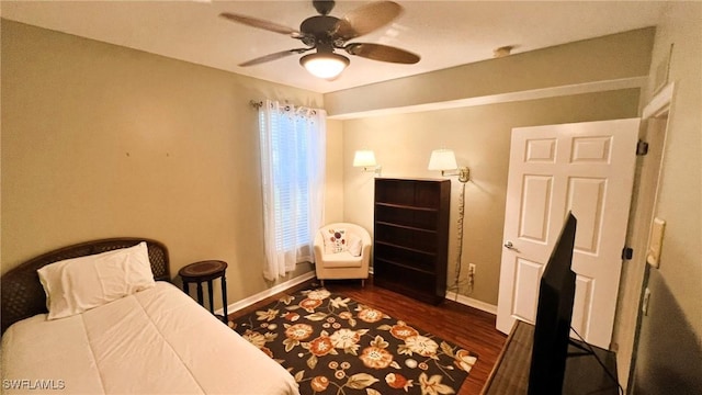 bedroom with ceiling fan and wood-type flooring