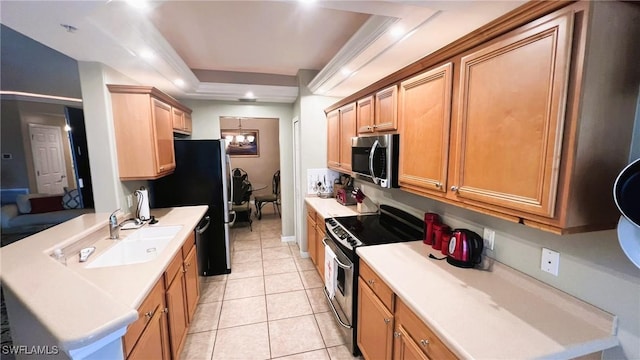 kitchen featuring stainless steel appliances, sink, light tile patterned floors, and a chandelier