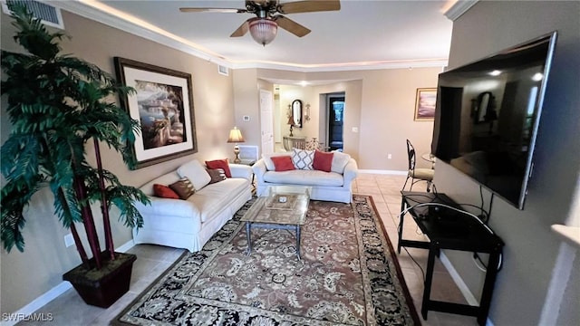 tiled living room with ornamental molding and ceiling fan