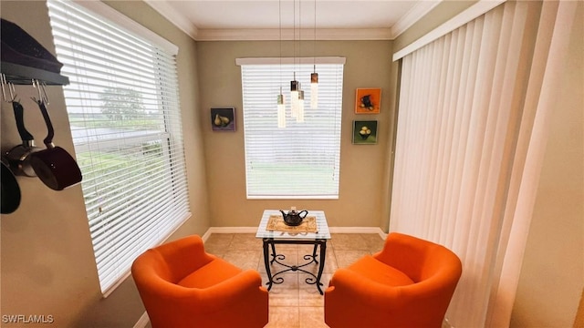 sitting room with crown molding and light tile patterned floors