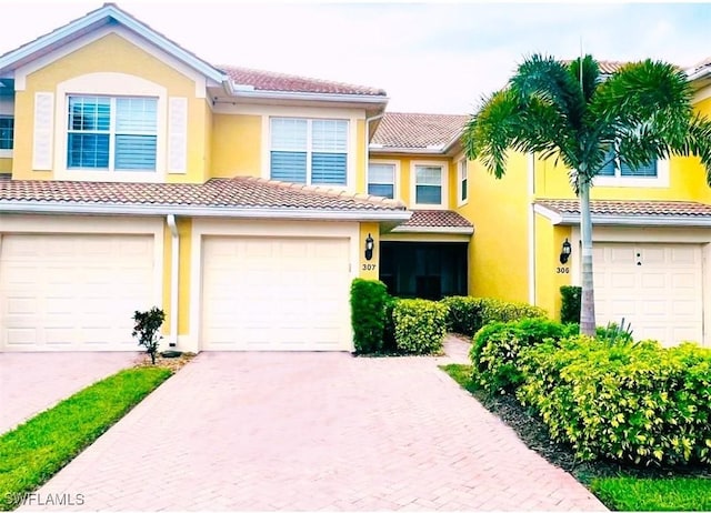 view of front of home with a garage