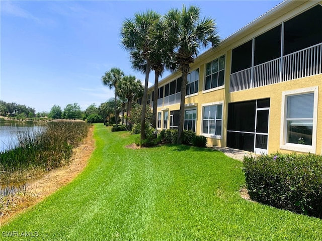 view of yard featuring a water view