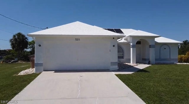 view of front of home with a front lawn