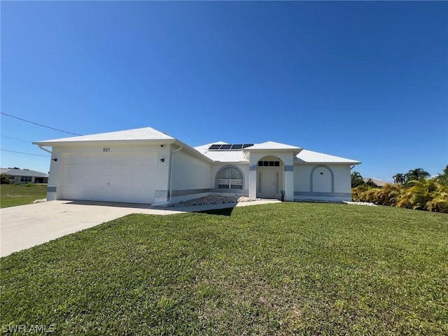 ranch-style house with a front lawn, a garage, and solar panels