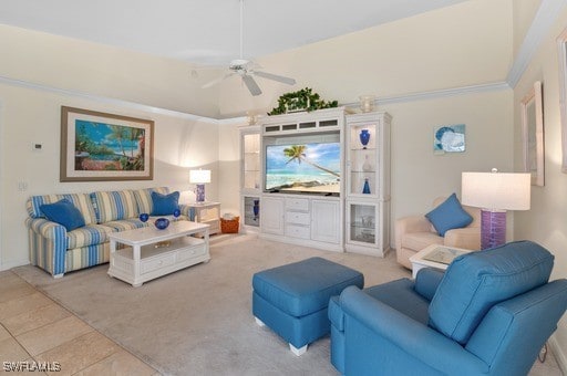 tiled living room featuring ceiling fan and high vaulted ceiling