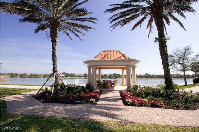 view of property's community featuring a gazebo and a water view