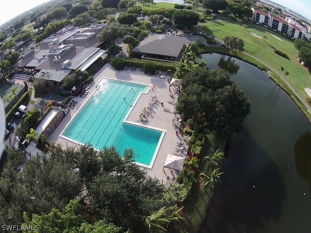 birds eye view of property with a water view