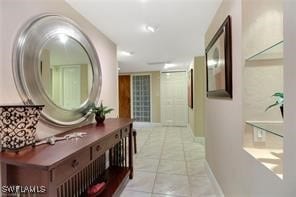 corridor featuring light tile patterned flooring