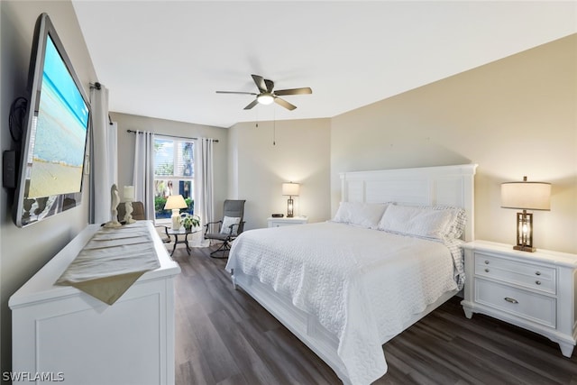 bedroom featuring dark hardwood / wood-style floors and ceiling fan