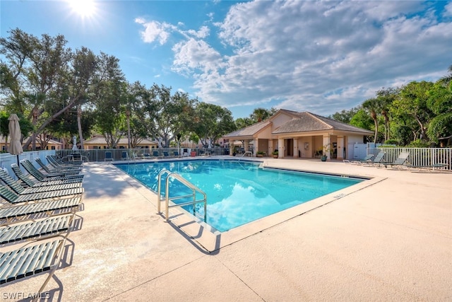 view of pool featuring a patio