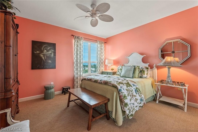 bedroom featuring ceiling fan and light carpet