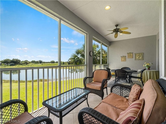16521 Goldenrod Ln Unit 202, Alva, FL 33920 - sunroom with a water view, ceiling fan, and an outdoor living space